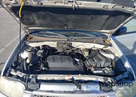 2003 Ford Escape Limited z USA, uszkodzony, nr VIN 1FMCU94173KA69460